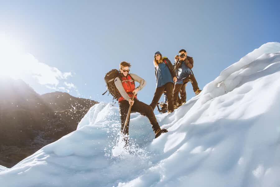 Fox Glacier: Up to 3 Hours Hike with Helicopter Transfer - Crampons, leather boots, poles, and wet-weather layers you’ll actually use