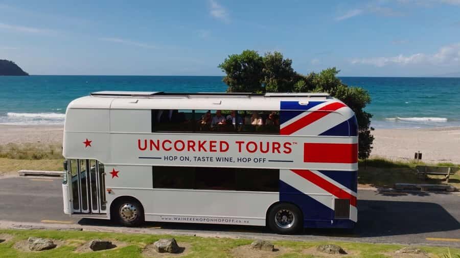 Waiheke Island: Scenic Island Wine Tour & Local Wine Tasting - Oneroa Village and the beach walk: why the non-winery time matters