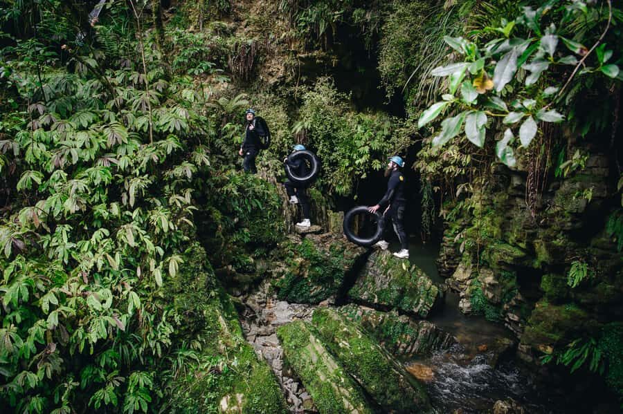 Waitomo Caves: Labyrinth Black Water Rafting Experience - Waterfall jumps and scrambling: the part that needs nerves of steel