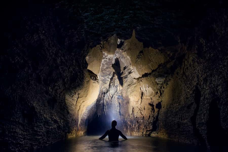 Waitomo Caves: Labyrinth Black Water Rafting Experience - What stalactites, stalagmites, and the underground river do for the experience